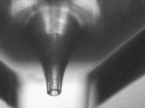 Microfluidic chip with 3D shaped nozzle